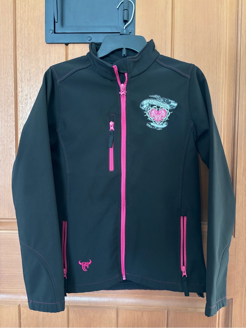 Black Cowgirl Hardware Jacket with Pink Trim and Crest Detail